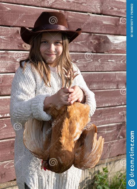 Country Girl Holding A Chicken In Her Arms Stock Image Image Of