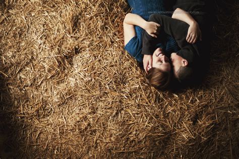 Captivating Photography By Sarah West Couple Rolling In The Hay