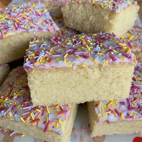 There Are Many Pieces Of Cake With Sprinkles On It