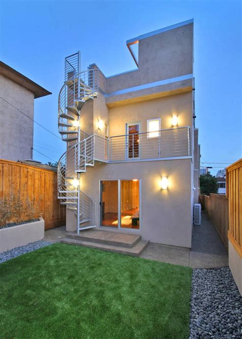 Contemporary Home Exterior With Spiral Staircase | HGTV