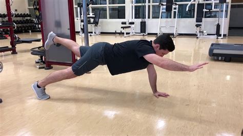 Alternating Superman Plank Exercise Library Youtube