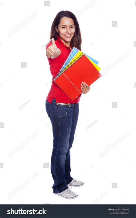 Full Body Portrait Of Female Student Giving Thumbs Up