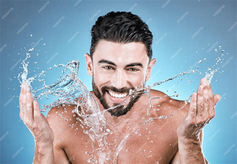 Premium Photo Portrait Water Splash And A Man Model Washing His Face