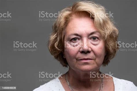 Serious Senior Woman Front Mugshot Stock Photo Download Image Now