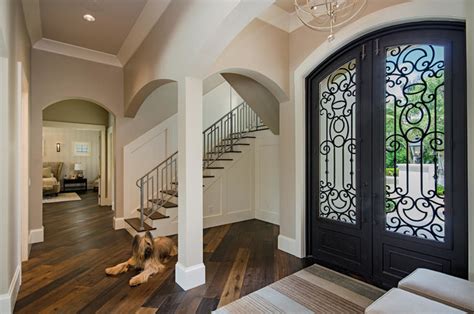 Transitional style best defines the interior design by parkyn design, a combination of the husband's appreciation for contemporary design and the wife's love of traditional elegance. Fort Myers Modern French Chateau - Transitional - Entry ...