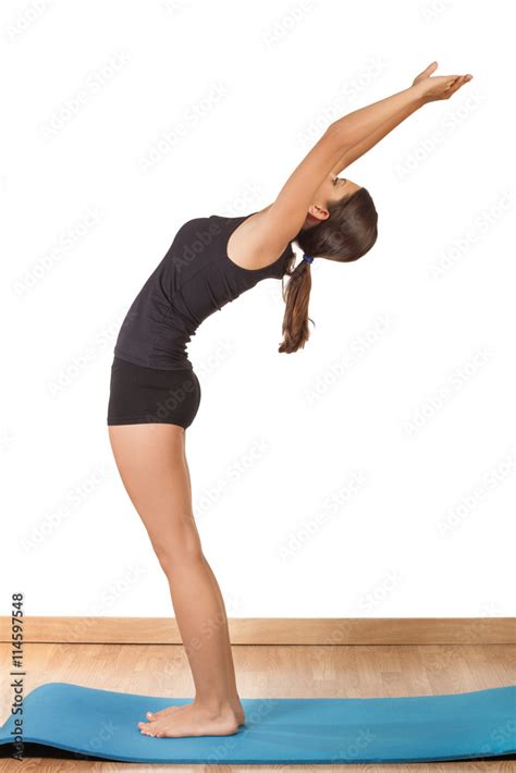 Mujer Practicando Estiramiento Espalda Yoga Sobre Una Esterilla Azul