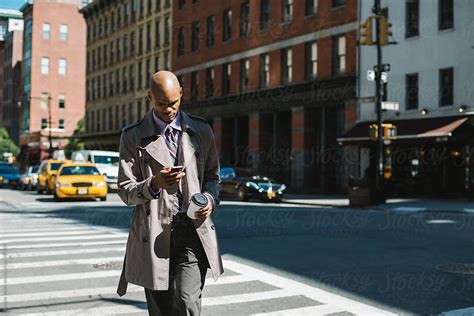 Black Businessman Walking In The Streets Of New York City Stocksy United