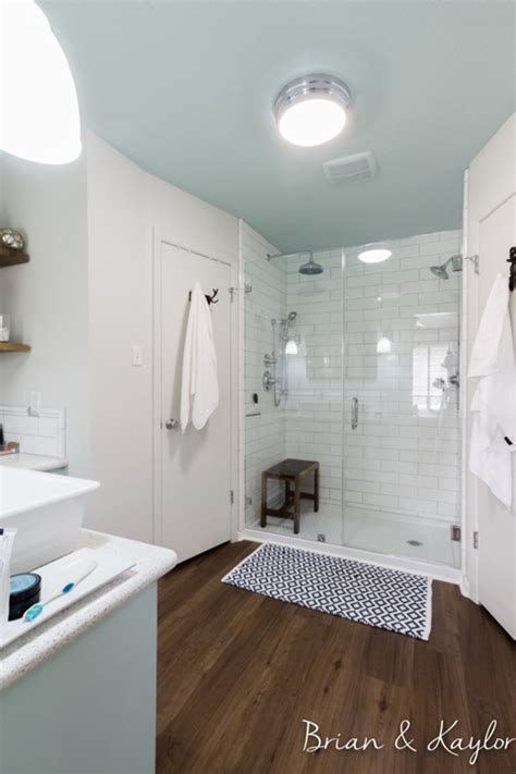 Tiled bathroom with shower stall curtain. Tub to Shower Conversion | Tub to Shower Conversion Cost