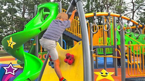 Kids Playing And Having Fun At Amazing Playground With Big Exciting
