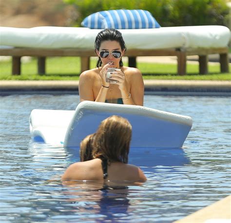 Kendall Jenner Tanning Her Ass In Green Bikini Poolside Porn Pictures