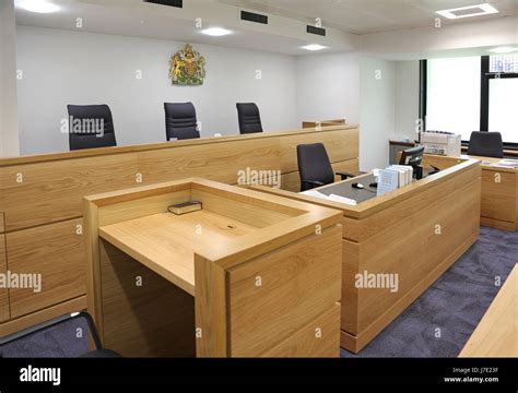 Interior Of A Modern English Courtroom Shows Judgesmagistrates Stock