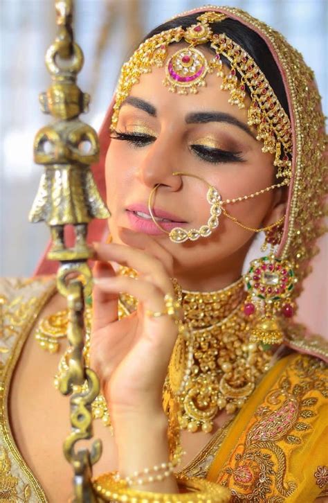 follow me mãđhű for more pics bridal makeover indian bridal makeup bridal nose ring