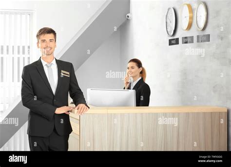 Hotel Receptionist Phone Male Hi Res Stock Photography And Images Alamy
