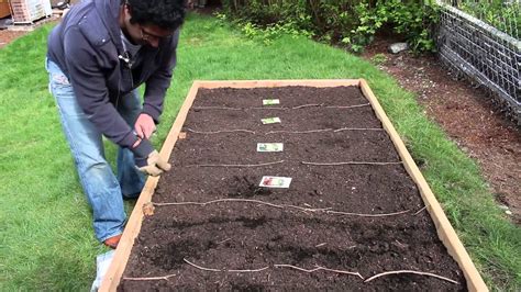 If you're planning to install your raised bed in the middle of a grass lawn. Building a raised-bed garden — Planting the seeds - YouTube