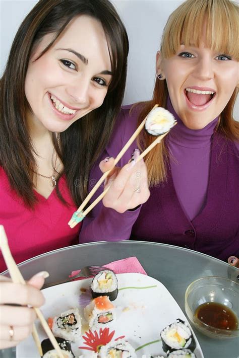 Womans Eating Sushi Picture Image