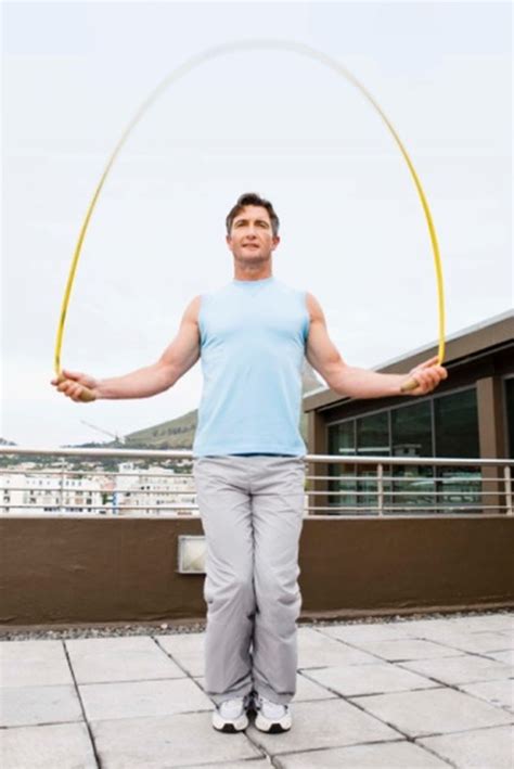 Measure where the handles reach to. What is the Correct Length for Jump Ropes? | Livestrong.com