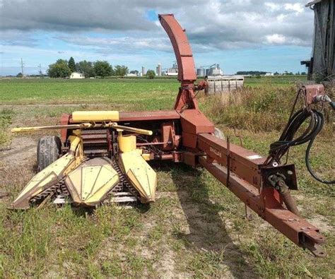 New Holland 900 Chopper With Corn Head Albrecht Auction Service