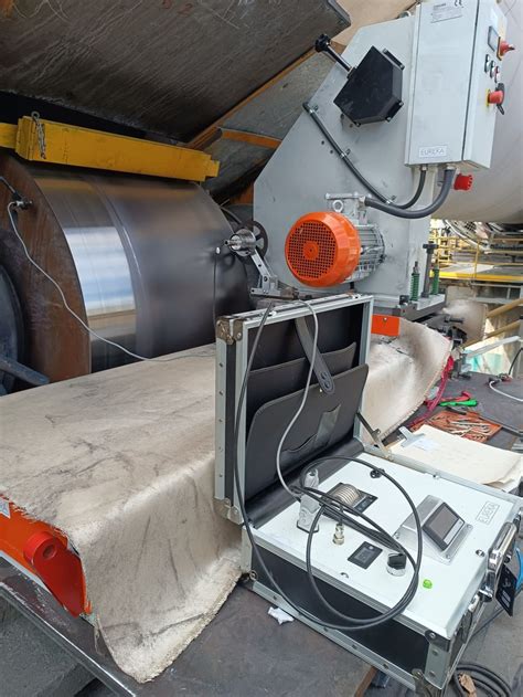 Grinding job of a worn kiln roller - Solutions for on-site machining - TMS