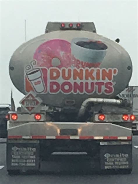 the back of a truck with dunkin donuts on it