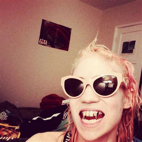 Grimes Wearing Custom Fangs By Japanese Dentist Turned Designer