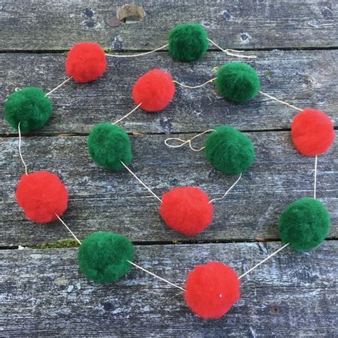 Green bay packers merchandise, best rated in cheerleading poms, green bay packers gold and green merchandise. Christmas pom pom garland, red and green on gold thread | Christmas pom pom, Pom pom garland ...