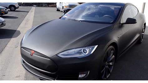 The model s comes with a dual motor setup delivering 760 horsepower, while the same setup in the this is done due to a completely blacked out exterior, matched with red details such as the tesla you can view the full build gallery of this model s p100d right below. Matte Black Wrapped Tesla Model S - Video