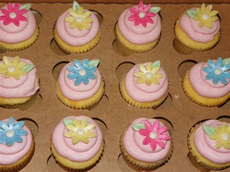 First, draw your preferred design on a sheet of parchment paper, then flip the paper over. Plumeria Cake Studio: Baby Girl Shower Cupcakes
