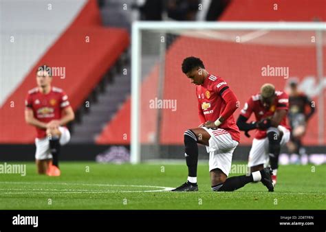 Manchester Uniteds Marcus Rashford Right Takes A Knee In Support Of