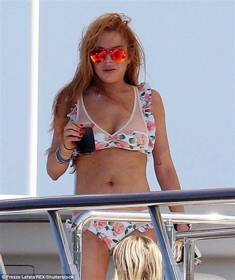 Pregnant Lindsay Lohan Pictured Smoking In Sardiana After Egor