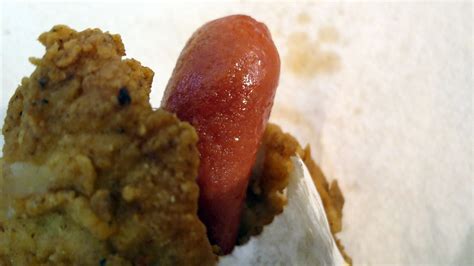 The double down dog, which is being sold in select locations in the philippines, is a hot dog that has been wrapped in a fried chicken bun and doused with cheese. Taste Test: The DIY KFC Double Down Dog | Lifehacker Australia
