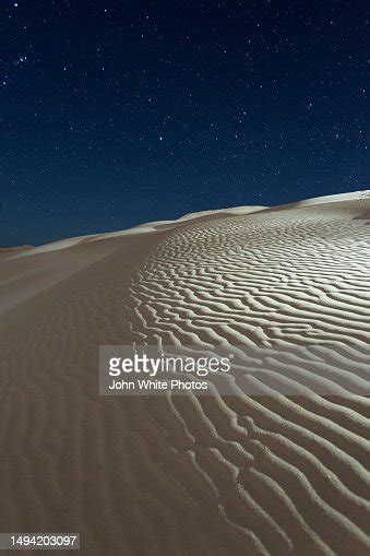 The Milky Way Stars And The Night Sky Over Sand Dunes At Sleaford Bay