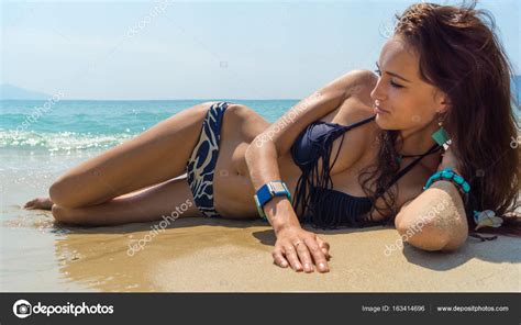 Beautiful Slender Girl In Bikini Sunbathing Stock Photo Levkomarov