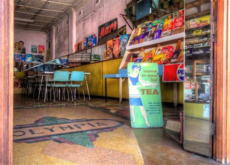 The olympia milk bar opened in 1939, following the closure of a billiard toom which had originally occupied the building. Parramatta Road, Inner West | Bus stop, Milk bar, Olympia