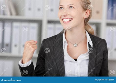 Businesswoman With Clenched Fist Looking Away Stock Photo Image Of