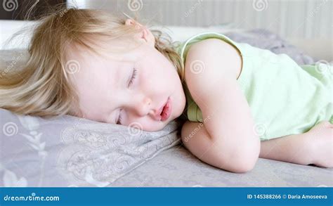 Cute Baby Girl Sleeping And Waking Up And Opening Eyes Smiling Child