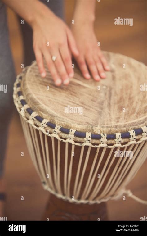 Playing The Bongo Drum Stock Photo Alamy