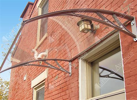 D) in white this rugged 1500 series white aluminum door this rugged 1500 series white aluminum door canopy is designed to stand up to harsh rain, snow and sun. Awnings Door & Black Fabric Awning Installed Over Front ...