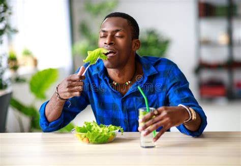 Healthy Eating Happy Young Black Man Eating Salad In Morning In