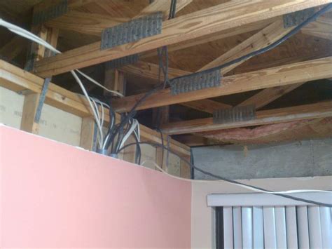 Romex Around Or Through Load Bearing Wall Studs Electrical Diy
