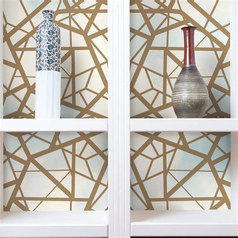 Give your walls a textural affect with this rose gold design. Shatter Geometric Peel & Stick Wallpaper in Sky and Gold ...