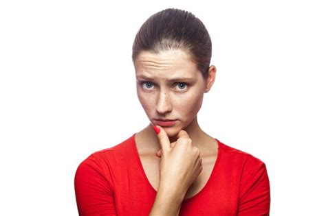 Premium Photo Portrait Of Thoughtful Serious Woman In Red Tshirt With