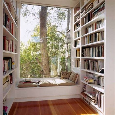 A bright windowsill seat with colorful pillows and textiles and closed storage on each side of the. Reading Corner Nook With Window Seat And Built In Bookcase ...