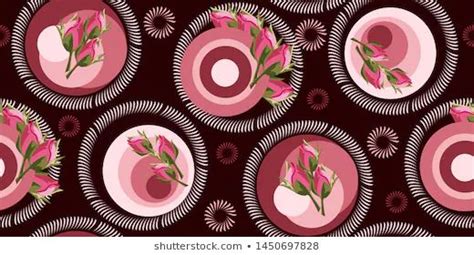 Pink Flowers Are In The Center Of A Circular Pattern On A Dark