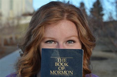 Sister Missionary Pose With The Book Of Mormon The Book Of Mormon Book Of Mormon Mormon