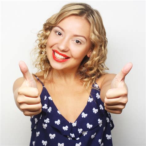 Young Woman Showing Thumbs Up Gesture Stock Photo Image Of Person