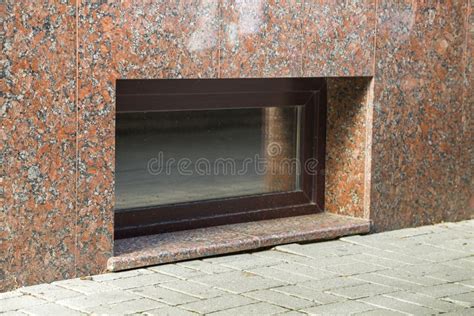 Close Up View Of Part Of A Building Facade With The Surface Of Granite