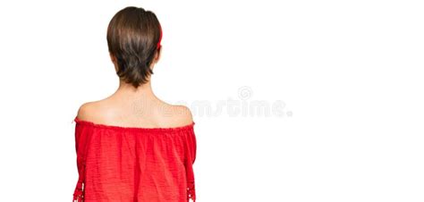 Young Brunette Woman With Short Hair Wearing Casual Summer Clothes And