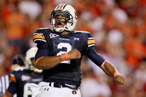 Quarterback Cameron Newton 2 Of The Auburn Tigers Reacts After Rushing