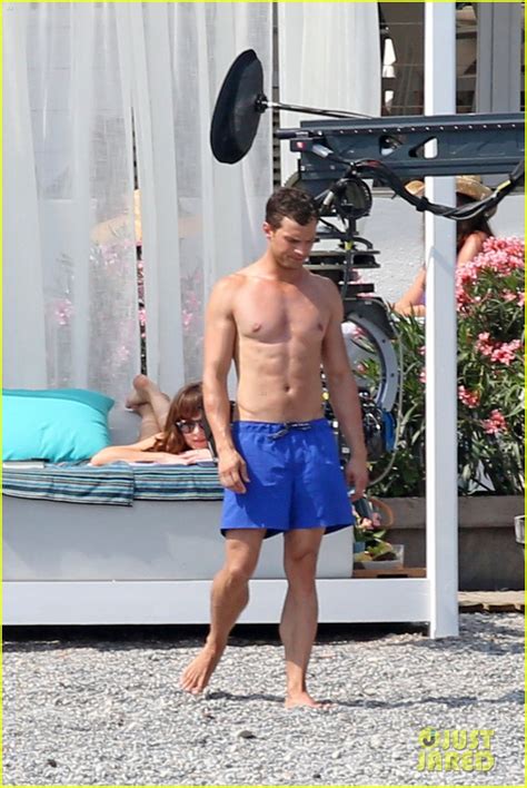 Shirtless Jamie Dornan And Bikini Clad Dakota Johnson Film Fifty Shades Beach Scene Photo