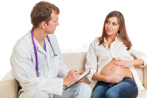 Abdomen De La Mujer Embarazada Y La Mano Del Doctor Foto De Archivo Imagen De Medicina Humano